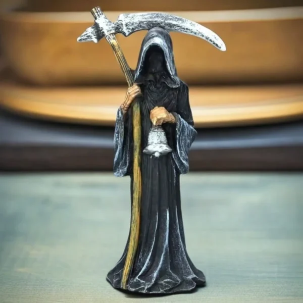 17 cm tall resin grim reaper statue holding a sickle and bell, dressed in a black hooded robe